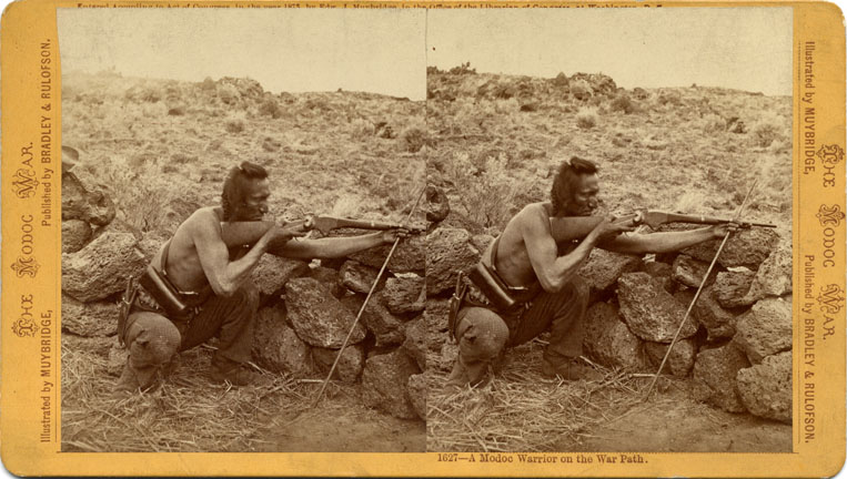 "A Modoc warrior on the war path." Stereograph by E. Muybridge.