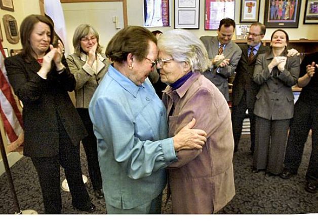Phyllis Lyon, left, and Del Martin, who have been together for 51 years, embrace after their marriage at City Hall in 2004. They were the first legally married same-sex couple in San Francisco. Photo: Liz Mangelsdorf, The Chronicle