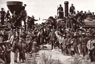Golden Spike ceremony completing the Transcontinental Railroad.