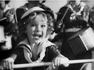 Shirley Temple in a scene from the movie “Stand Up and Cheer” (1934). Photo courtesy of Fox Film Corporation.