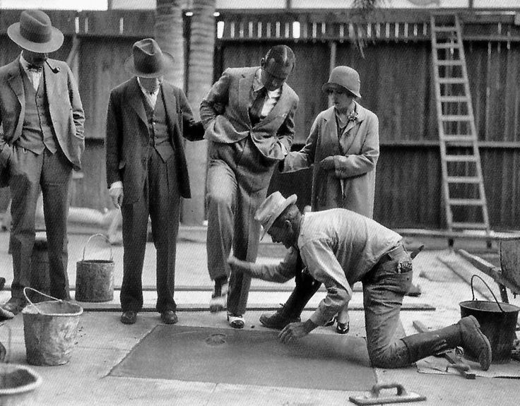 Douglas Fairbanks and Mary Pickford footprints in concrete at Grauman's Chinese Theater (1927).