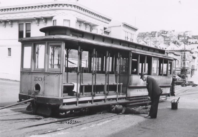 Market Street cable car 133 waiting to be towed to the scrapper. Courtesy Waynee Miller Collection.