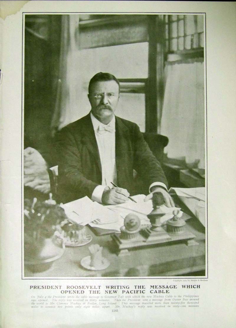 President Roosevelt writing the message that opened the Pacific Cable (1903).